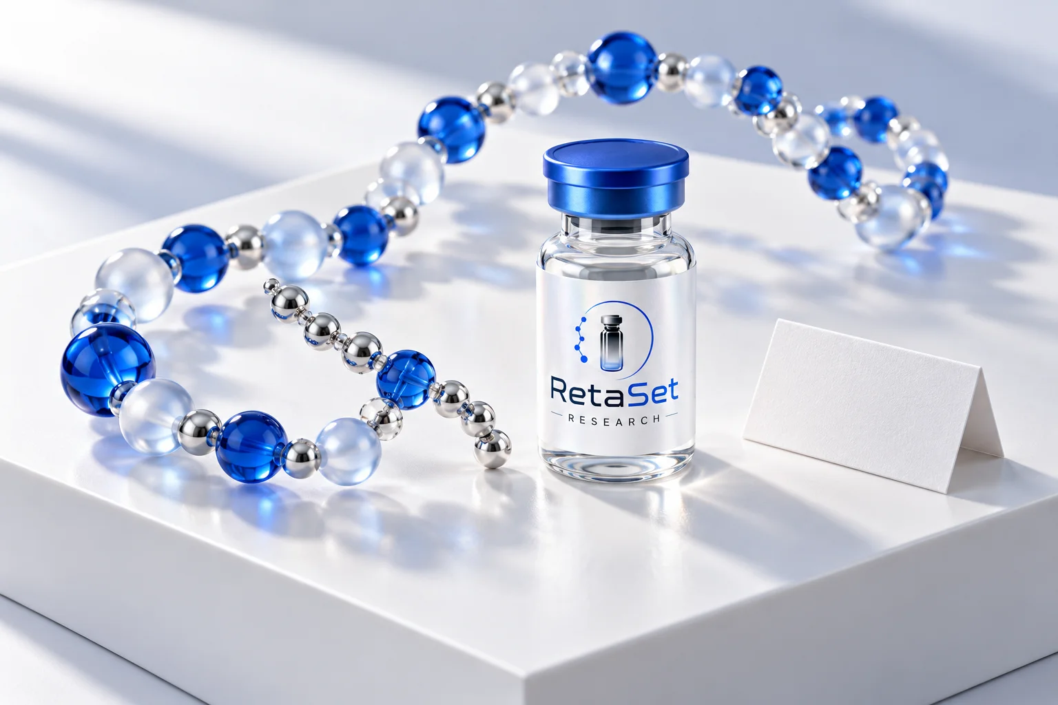Conceptual blue and frosted peptide-chain sculpture beside a RetaSet research vial and blank documentation card
